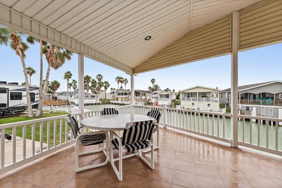 Coastal Canal Cottage - Waterfront, Dock, Pools - Image 1